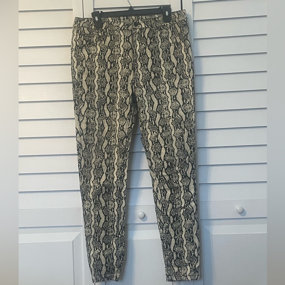 High rise skinny leg snake print jeans.